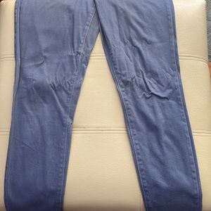 Women’s Light Blue Stretched Mid Rise Rockstar Pants.